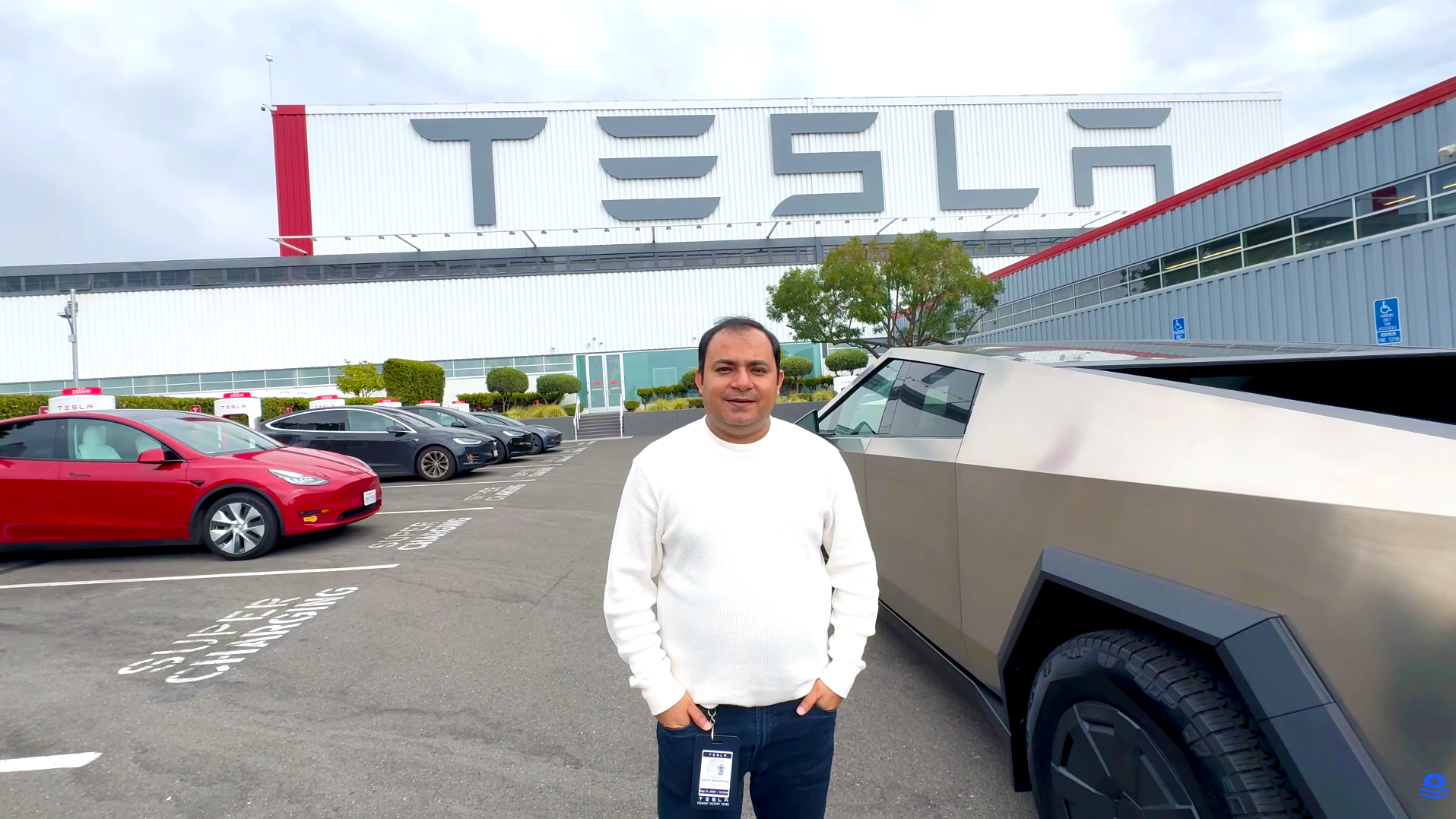 WPBrigade CEO Muhammad Adnan at Tesla factory with Cybertruck